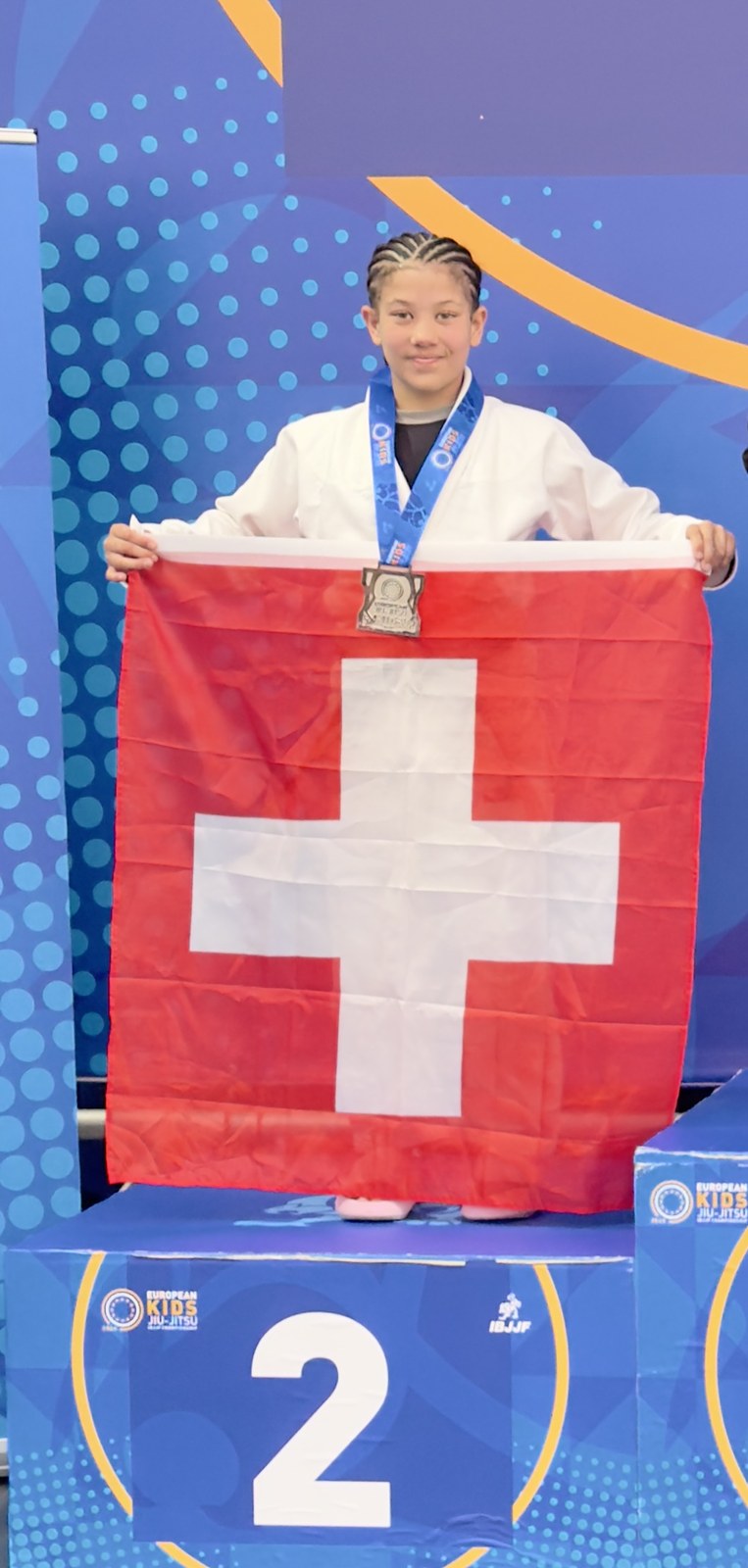 Second place at the European Kids IBJJF Championship 2026 in Dublin, on the podium with the Swiss flag.